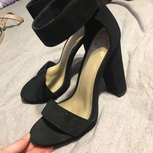 Black heels with a simple strap